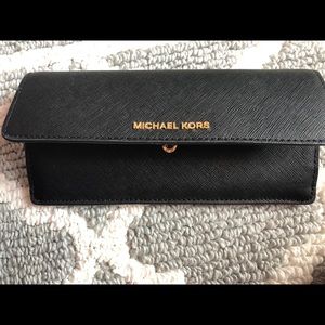 Michael kors black wallet.  SOLD